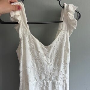 White beautiful medium size dress no longer needed it’s not fit on me anymore.